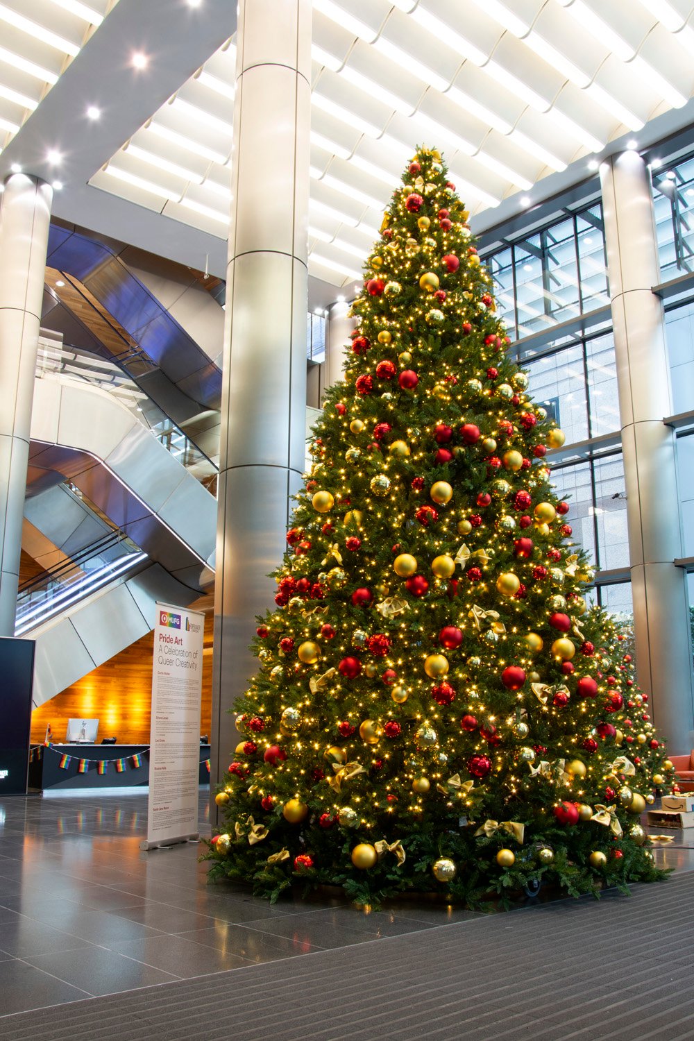 Large Christmas tree with large baubles and lights